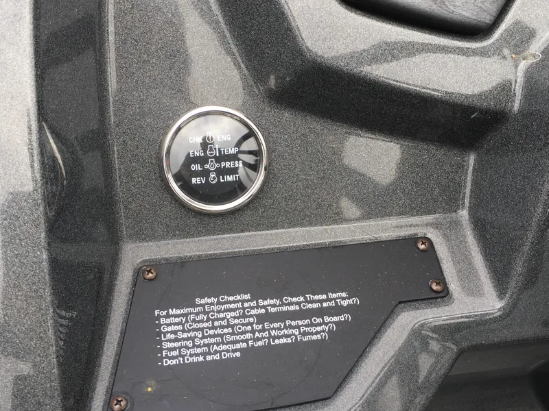 Slide: The Image of 2022 Crest Classic LX 240 dashboard with safety checklist and engine indicators. - 9