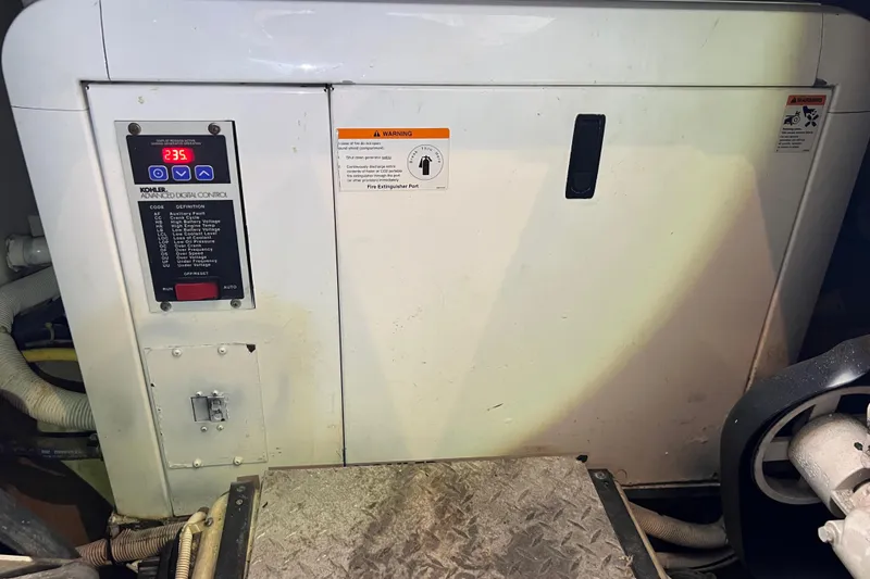 Slide: The Image of 2006 Carver 444 Cockpit Motor Yacht - Generator - 28