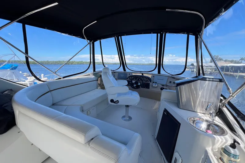 Slide: The Image of 2006 Carver 444 Cockpit Motor Yacht - Helm Seating - 8