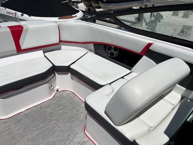 Slide: The Image of 2016 Regal 2000 ESX Bowrider interior with white and red seating. - 11