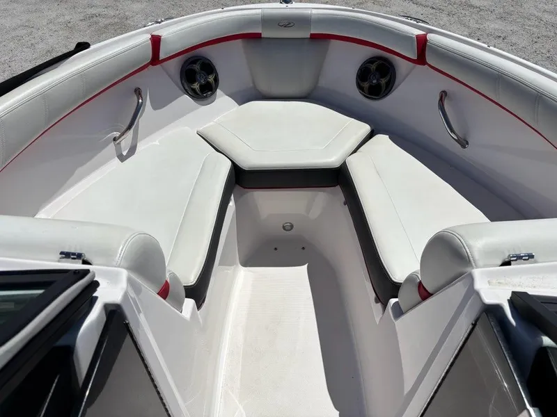 Slide: The Image of 2016 Regal 2000 ESX Bowrider interior with white seating and red accents. - 4
