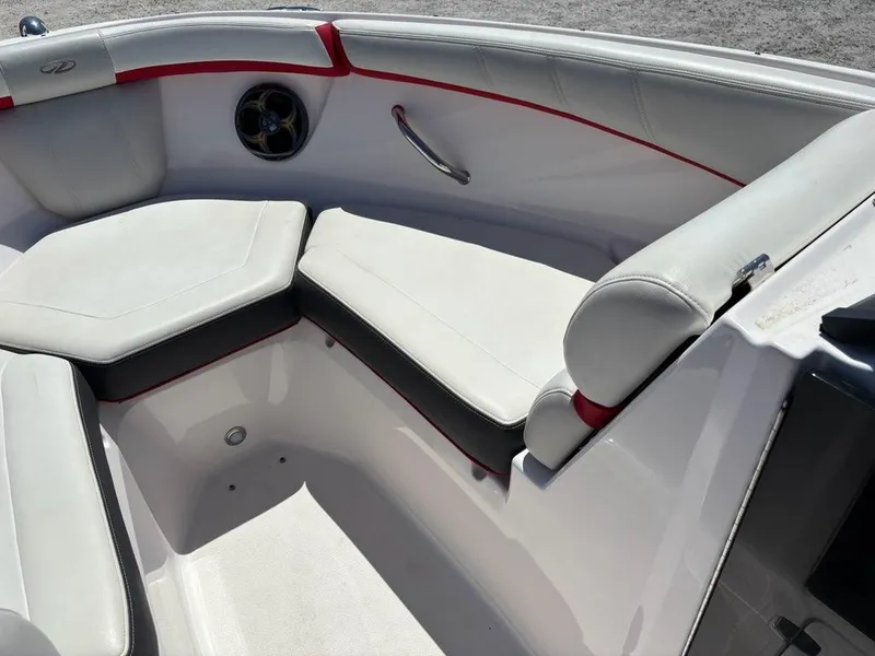 Slide: The Image of 2016 Regal 2000 ESX Bowrider interior with white seating and red accents. - 6