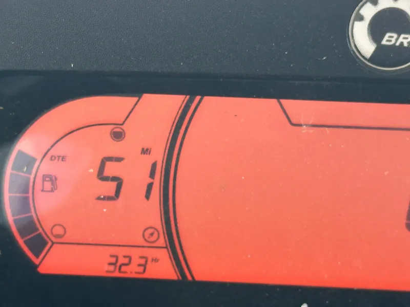 Slide: The Image of Dashboard display of 2023 Sea-Doo GTX 230 showing 51 miles range and 32.3 hours usage. - 6