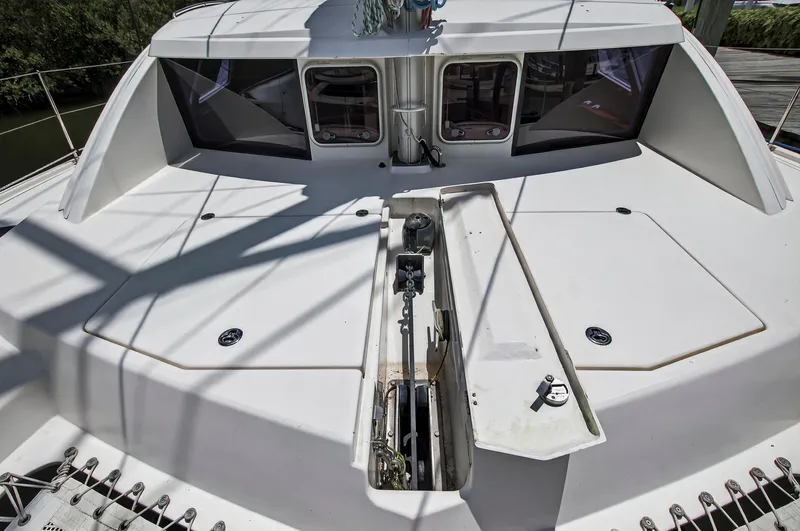 Slide: The Image of 2011 Leopard 38 catamaran deck with hatches and winch system. - 50