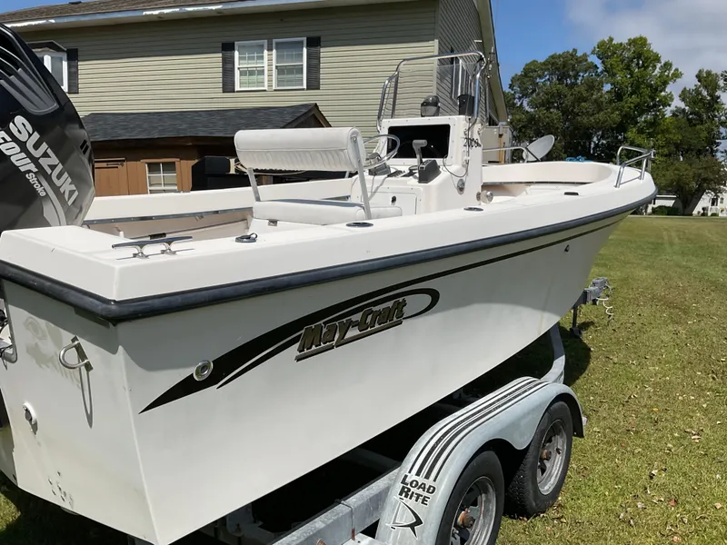 Slide: The Image of 2007 May-Craft 2000CC boat on trailer, featuring Suzuki outboard motor. - 3