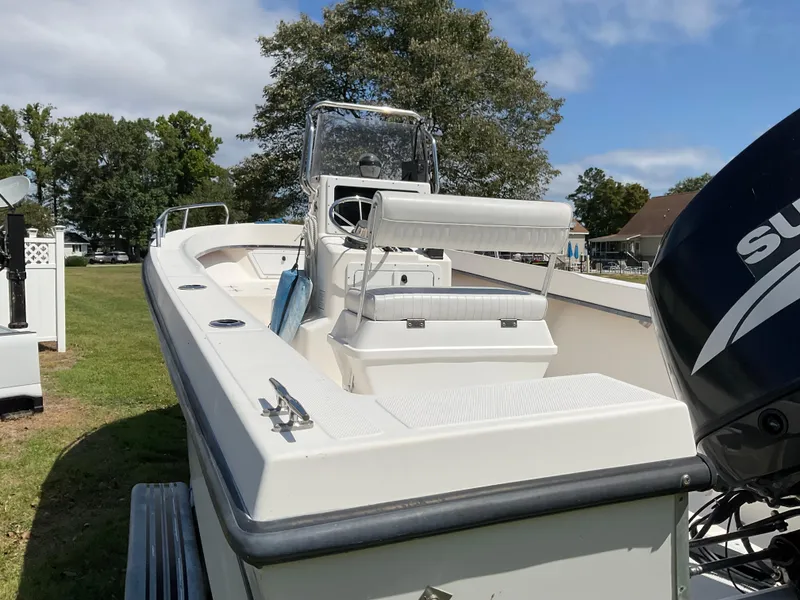 Slide: The Image of 2007 May-Craft 2000CC boat with Suzuki outboard motor, parked on grass. - 5