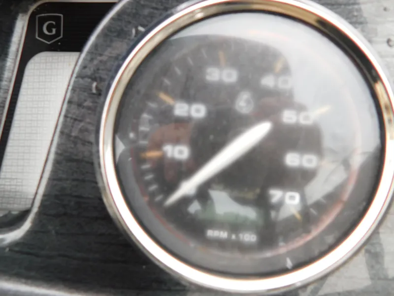 Slide: The Image of Close-up of a speedometer on a 2019 Godfrey SWEETWATER 2186 SB boat. - 13