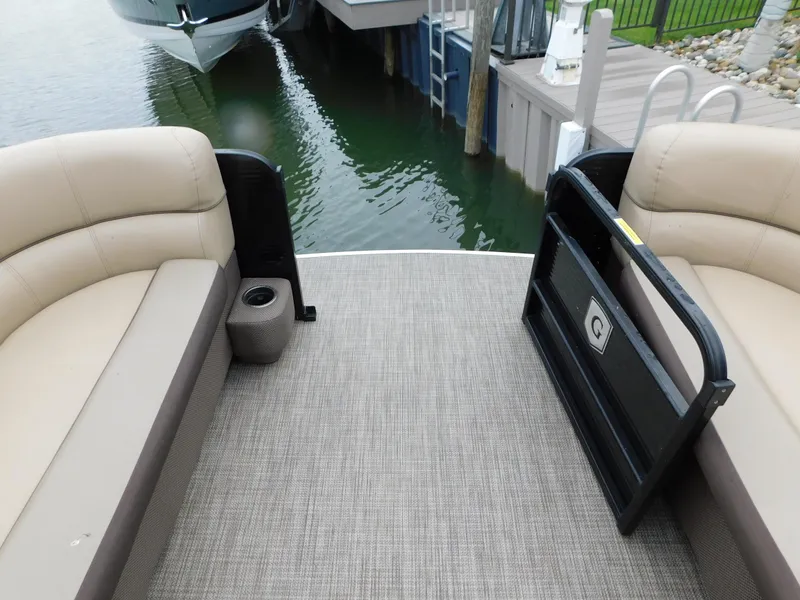 Slide: The Image of 2019 Godfrey SWEETWATER 2186 SB pontoon boat interior with beige seating and water view. - 22