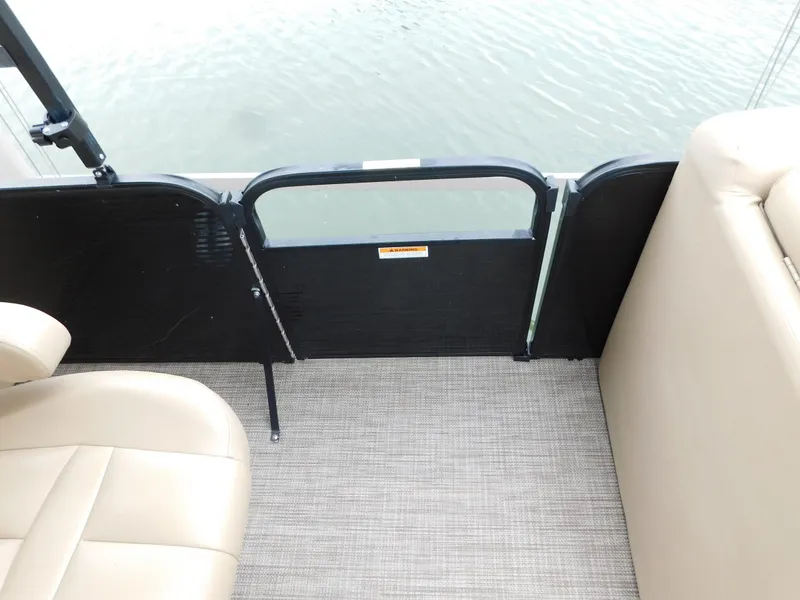 Slide: The Image of Interior view of 2019 Godfrey SWEETWATER 2186 SB pontoon boat with beige seating. - 25