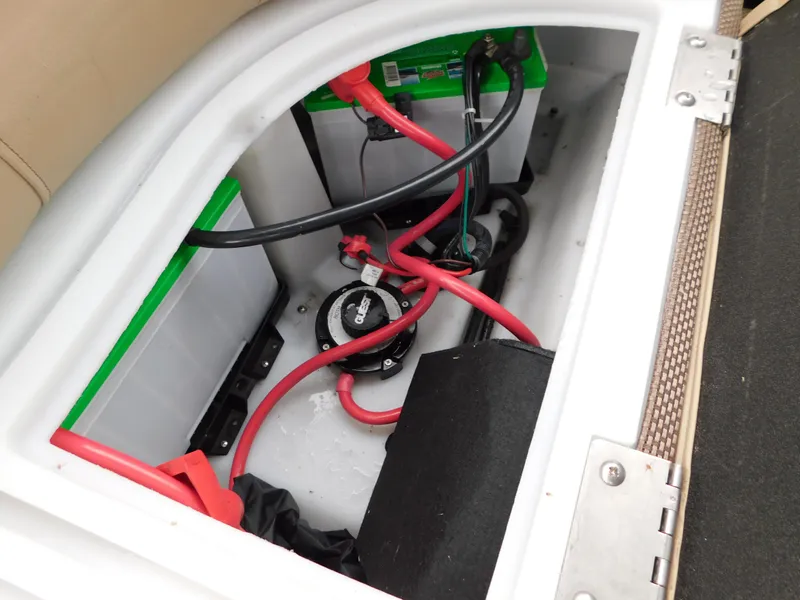 Slide: The Image of Battery compartment of 2019 Godfrey SWEETWATER 2186 SB with wiring and connections. - 31