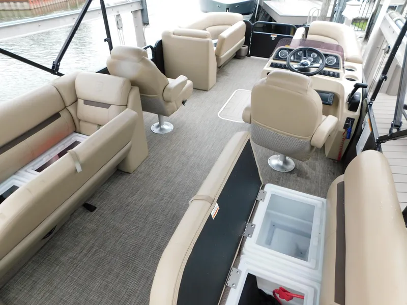 Slide: The Image of 2019 Godfrey SWEETWATER 2186 SB pontoon boat interior with beige seating and storage compartments. - 40
