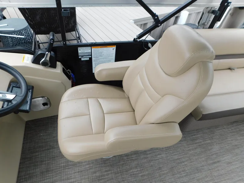 Slide: The Image of Captain's chair on 2019 Godfrey SWEETWATER 2186 SB pontoon boat, beige upholstery. - 9