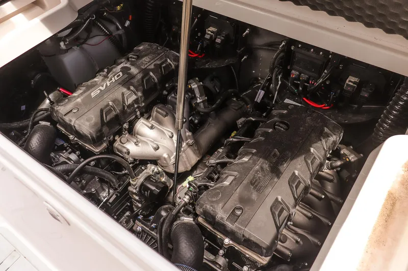 Slide: The Image of Engine compartment of 2025 Yamaha Boats 255 FSH Sport E, showcasing dual SVHO engines. - 20