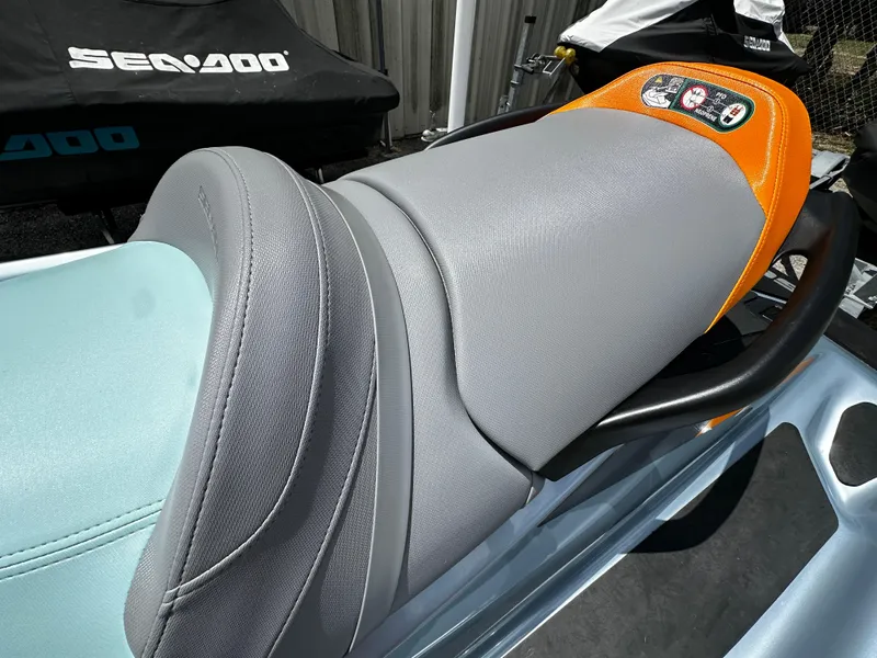 Slide: The Image of 2023 Sea-Doo GTI SE 170 seat with gray and orange design, close-up view. - 10