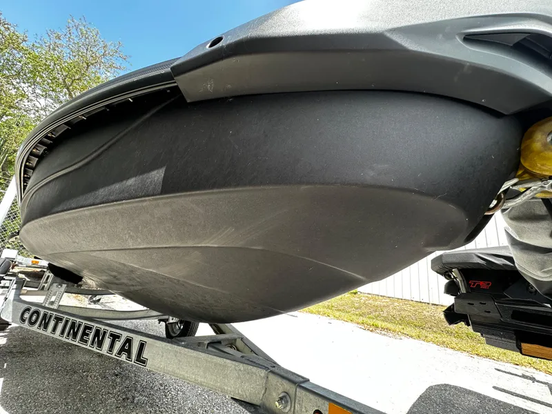 Slide: The Image of 2023 Sea-Doo GTI SE 170 on trailer, showcasing hull design. - 16