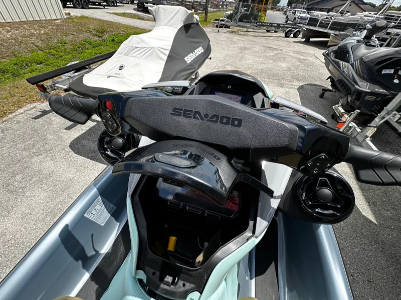 Slide: The Image of 2023 Sea-Doo GTI SE 170 jet ski dashboard and handlebars in outdoor setting. - 20