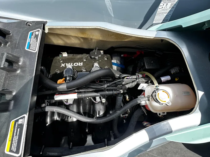 Slide: The Image of 2023 Sea-Doo GTI SE 170 engine compartment showcasing Rotax engine components. - 21