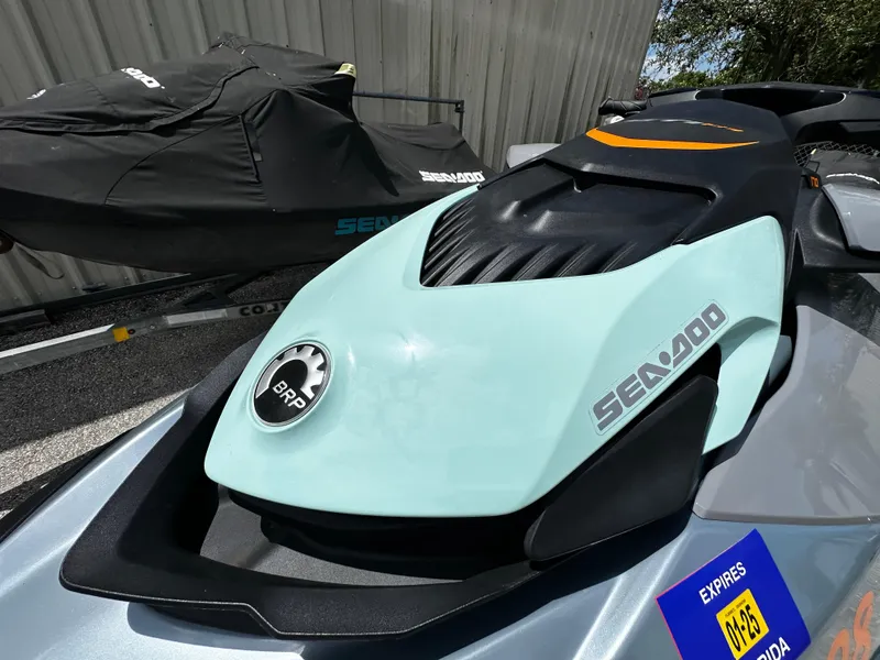 Slide: The Image of 2023 Sea-Doo GTI SE 170 jet ski, close-up view, parked outdoors. - 5