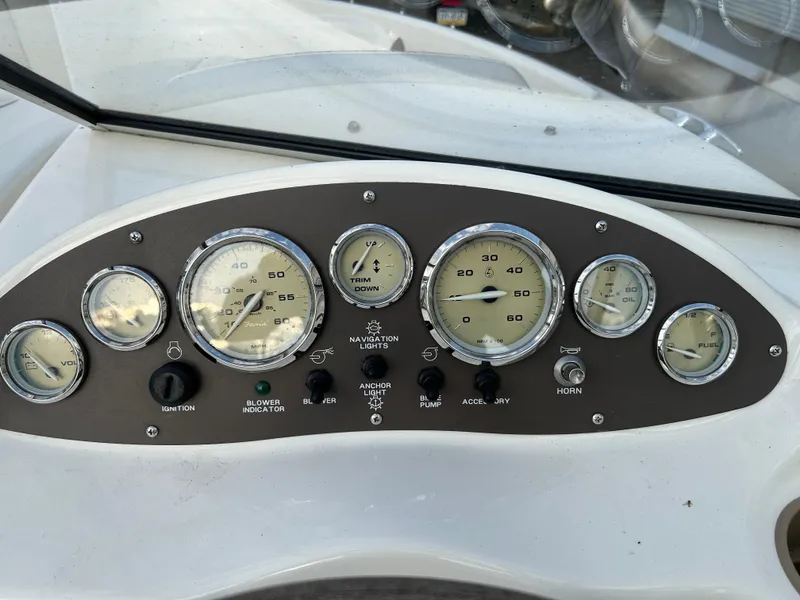 Slide: The Image of Dashboard of a 2003 Bayliner 175 Bowrider with gauges and controls. - 4