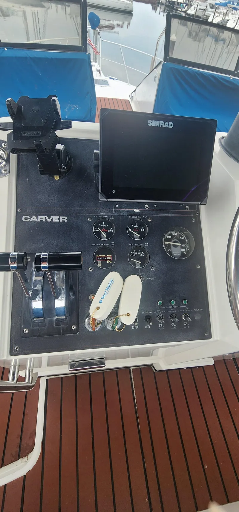 Slide: The Image of Control panel of a 1990 Carver 38 Santego yacht with Simrad display. - 31