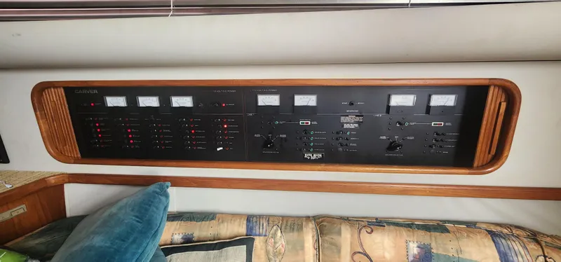 Slide: The Image of Control panel of a 1990 Carver 38 Santego yacht with gauges and switches. - 32