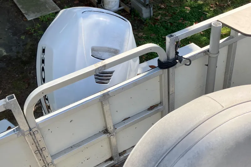 Slide: The Image of 1996 Smoker Craft 820 boat with Honda outboard motor, viewed from above. - 13