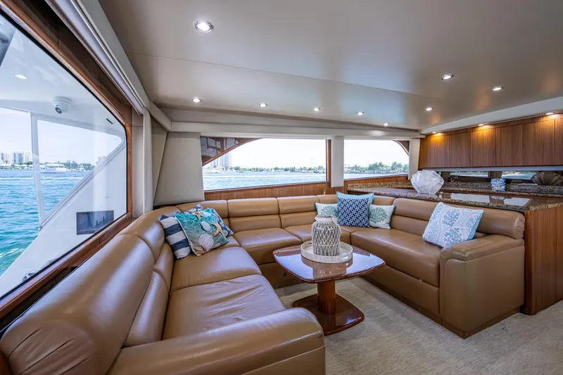 Slide: The Image of Luxurious interior of 2005 Viking 61 yacht with leather seating and ocean view. - 53