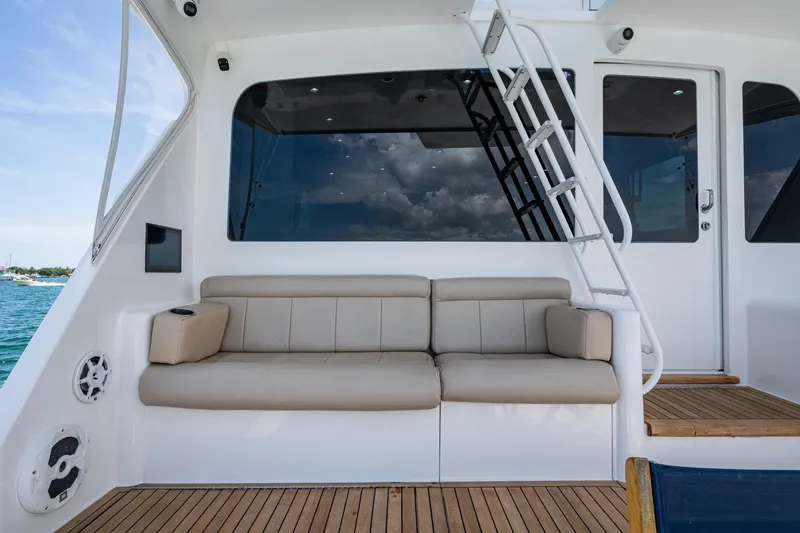 Slide: The Image of Luxurious seating area on a 2005 Viking 61 yacht with ocean view. - 55