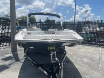 Slide: The Image of 2025 Starcraft SV 16 boat on trailer, parked outdoors under a cloudy sky. - 3