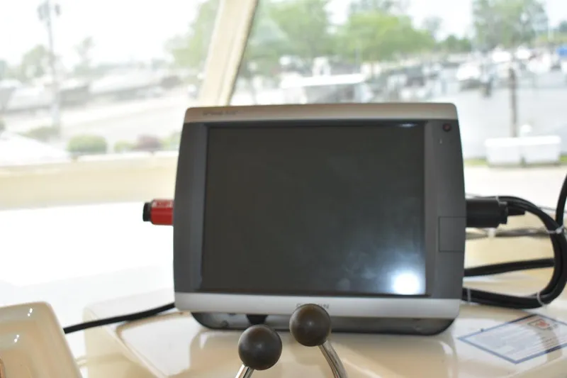 Slide: The Image of Boat navigation system on 1967 Hatteras 41 Twin Cabin yacht dashboard. - 19