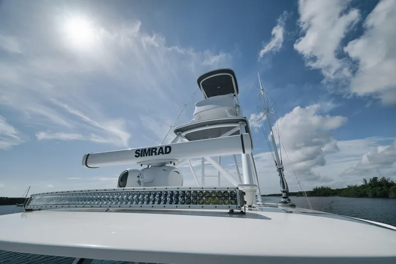 Slide: The Image of Freeman 47 boat with Simrad equipment under a bright sky, 2022 model. - 23