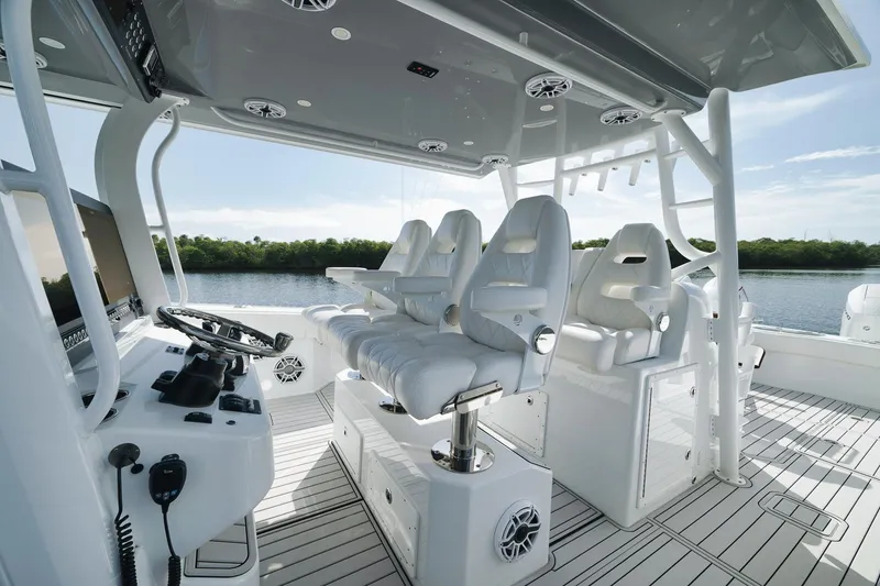 Slide: The Image of Luxurious 2022 Freeman 47 boat interior with plush seating and advanced navigation controls. - 31