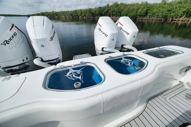 Slide: The Image of Freeman 47 boat with quad Racing 400 engines, 2022 model, on calm water. - 39