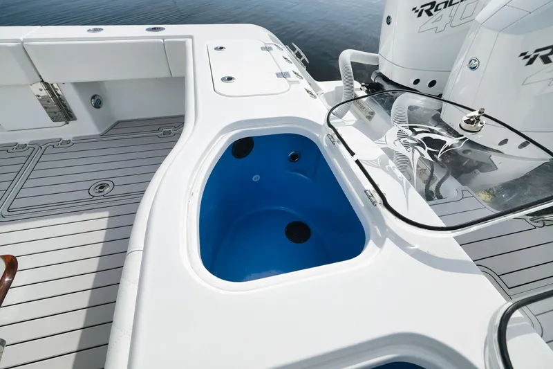 Slide: The Image of Freeman 47 boat deck with blue livewell, 2022 model. - 41