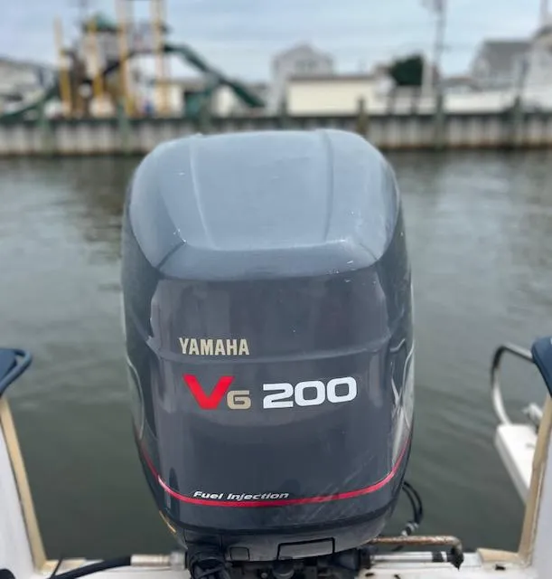 Slide: The Image of Yamaha V6 200 outboard motor on a 2000 Grady-White Adventure 208 boat. - 7