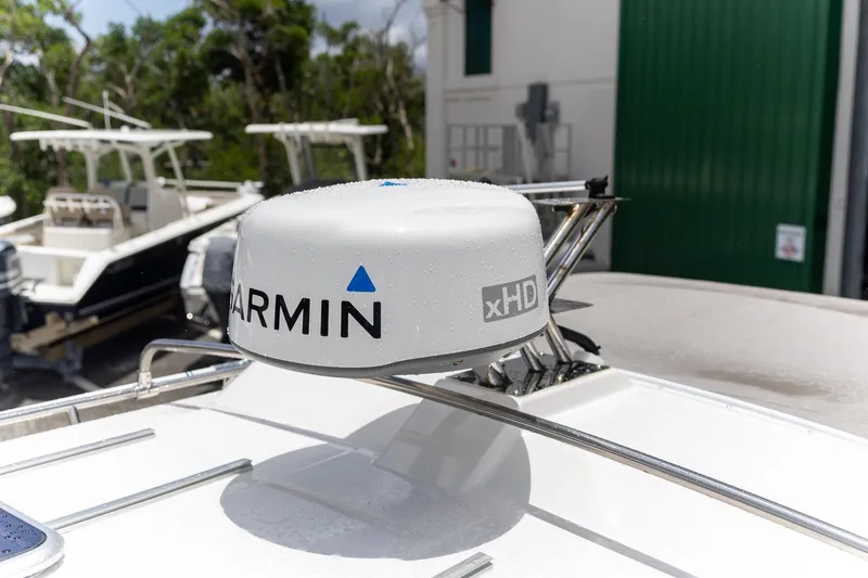 Slide: The Image of Garmin xHD radar on 2023 Cutwater C-248 Coupe boat, with other boats in the background. - 24