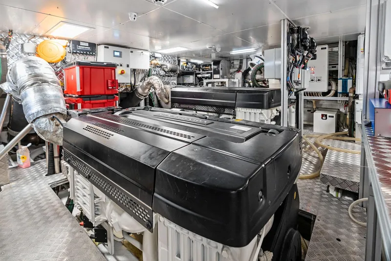 Slide: The Image of Engine room of 2023 Wally WHY 150 yacht, featuring advanced machinery and equipment. - 112