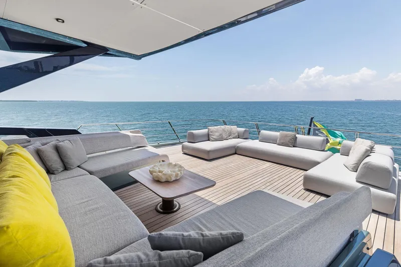 Slide: The Image of Luxurious 2023 Wally WHY 150 yacht deck with modern seating and ocean view. - 21