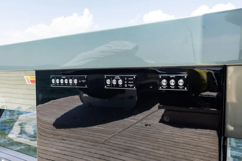 Slide: The Image of Control panel on 2023 Wally WHY 150 yacht, featuring various switches and buttons. - 29