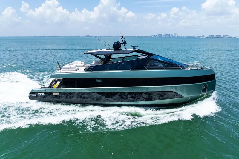 Slide: The Image of Luxury yacht Wally WHY 150, 2023 model, cruising on clear blue waters. - 3