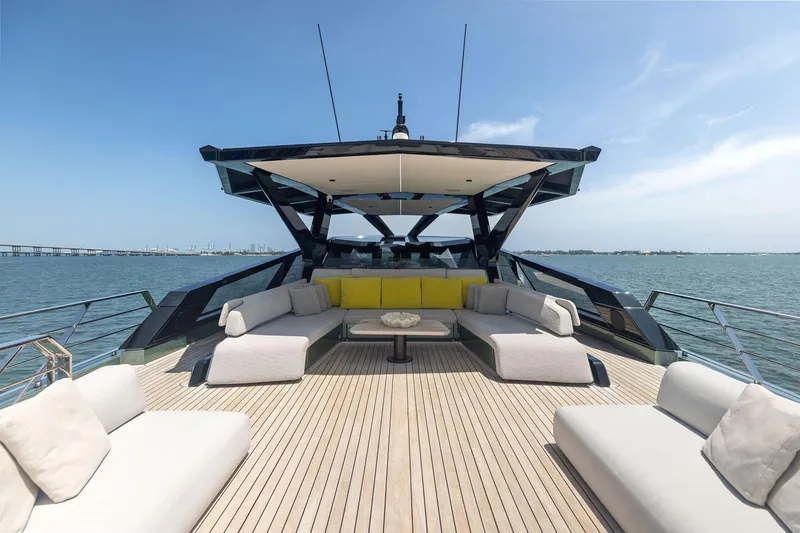 Slide: The Image of Luxurious 2023 Wally WHY 150 yacht deck with modern seating and ocean view. - 31