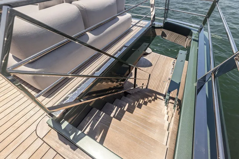 Slide: The Image of Staircase on 2023 Wally WHY 150 yacht with sleek design and ocean view. - 33