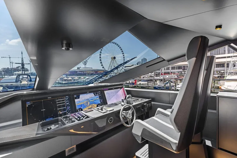 Slide: The Image of Modern helm of 2023 Wally WHY 150 yacht with advanced navigation systems. - 34