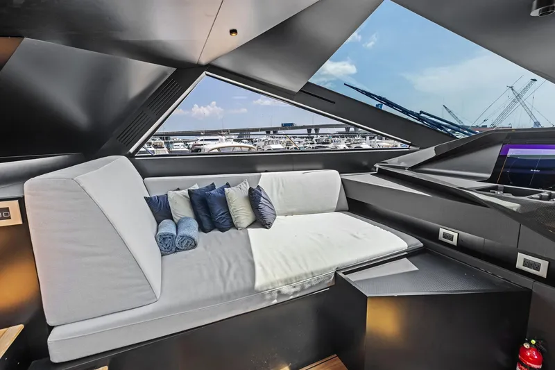 Slide: The Image of Luxurious interior of 2023 Wally WHY 150 yacht with modern seating and panoramic windows. - 40
