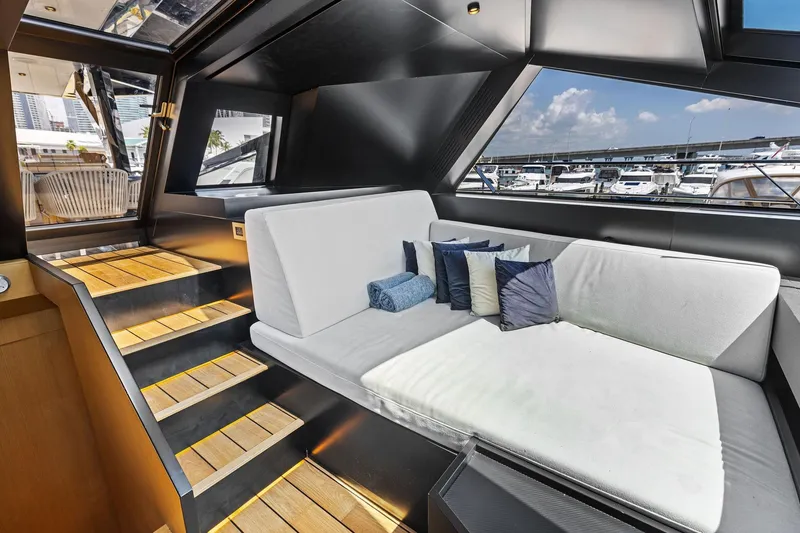 Slide: The Image of Luxurious interior of 2023 Wally WHY 150 yacht with modern seating and marina view. - 41