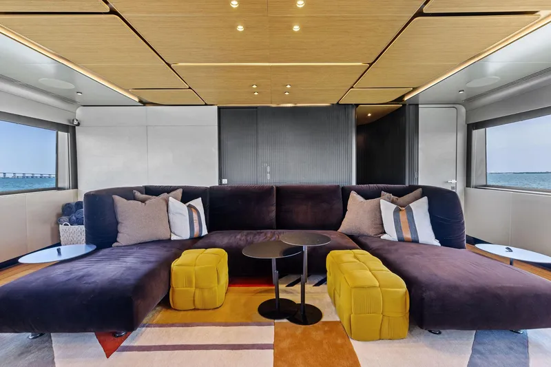 Slide: The Image of Luxurious interior of 2023 Wally WHY 150 yacht with modern seating and ocean view. - 43