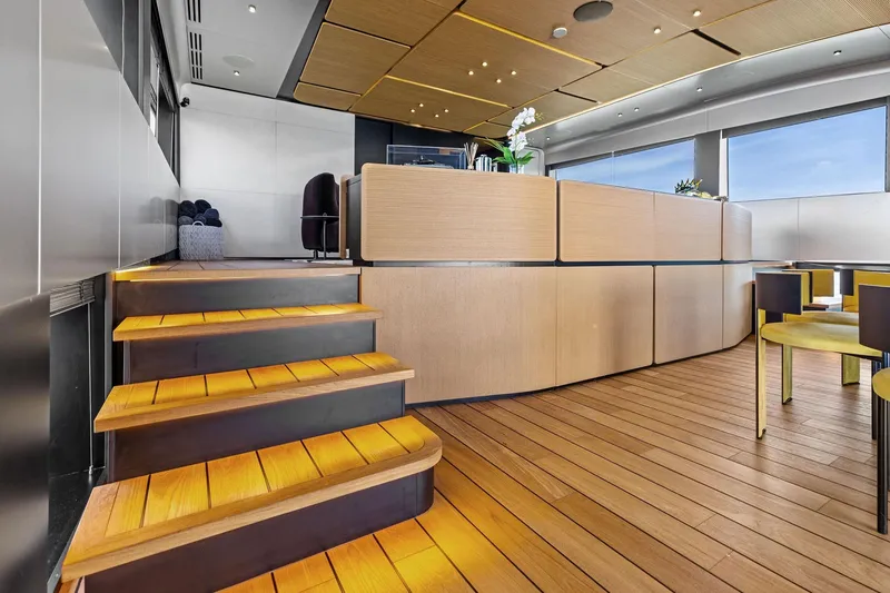 Slide: The Image of Luxurious interior of 2023 Wally WHY 150 yacht with modern wooden design and elegant furnishings. - 49