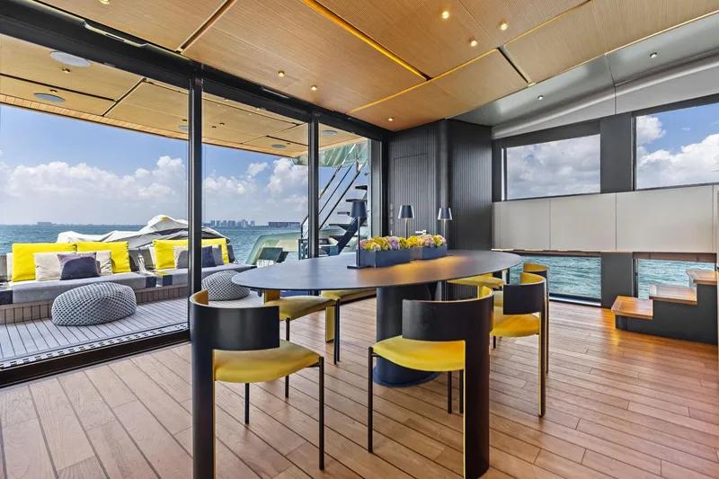 Slide: The Image of Luxurious interior of 2023 Wally WHY 150 yacht with ocean view and modern decor. - 54