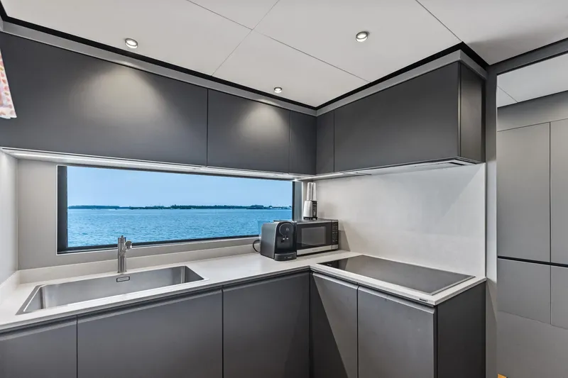 Slide: The Image of Modern kitchen interior on 2023 Wally WHY 150 yacht with ocean view. - 59