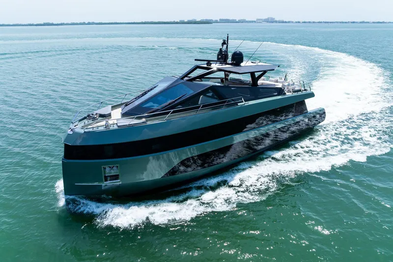 Slide: The Image of 2023 Wally WHY 150 yacht cruising on open water, showcasing sleek design and luxury. - 6